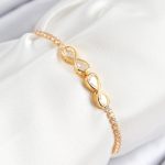 Pirinç Zirkon Taşlı Sonsuzluk Model Gold Renk Asansörlü Kadın Bileklik - Lisinya