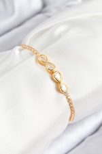 Pirinç Zirkon Taşlı Sonsuzluk Model Gold Renk Asansörlü Kadın Bileklik - Lisinya