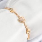 Pirinç Zirkon Taşlı Kar Tanesi Model Gold Renk Asansörlü Kadın Bileklik - Lisinya
