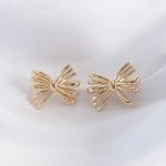 Pirinç Gold Renk Fiyonk Küpe - Vipsepet
