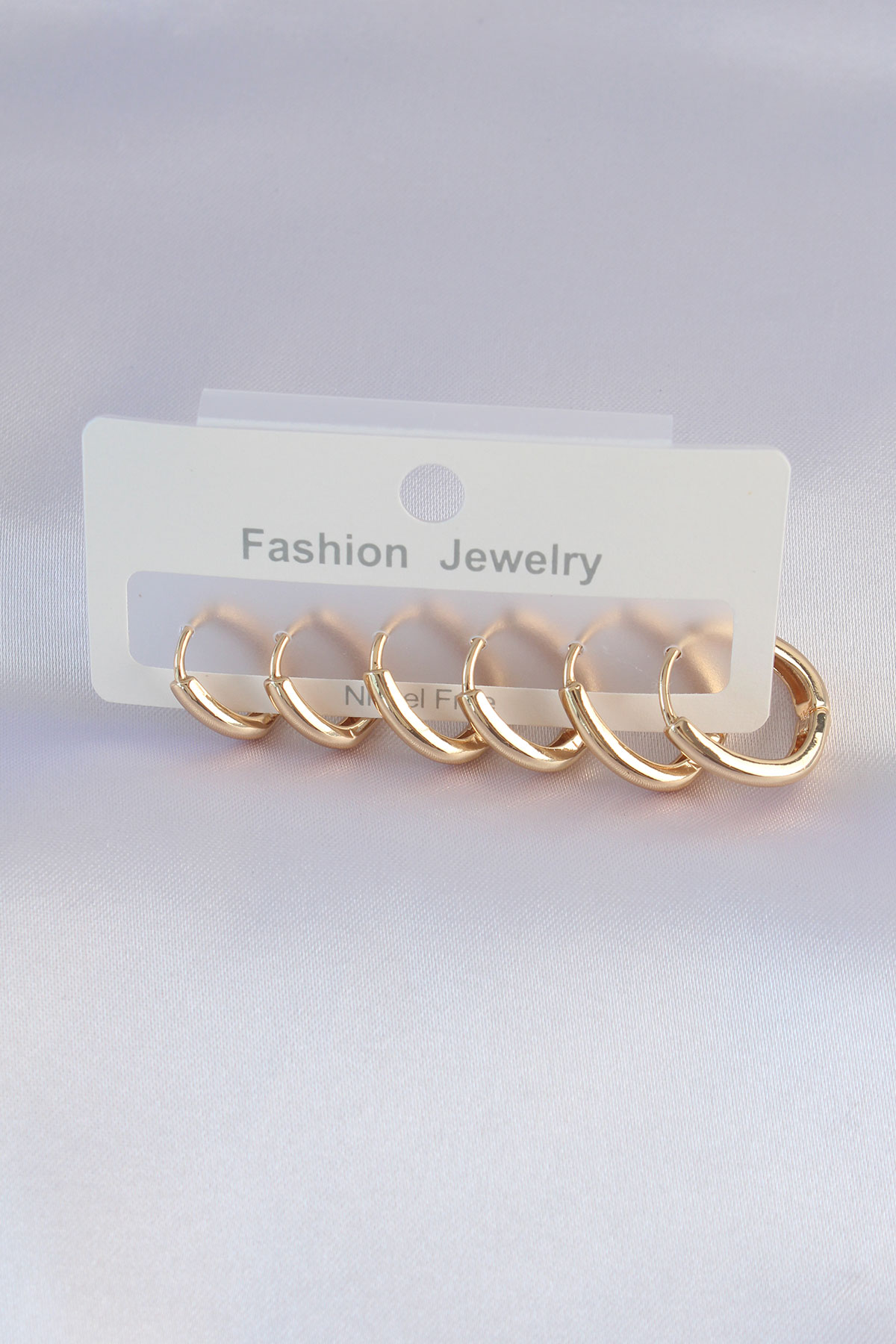 1717230618-bkp8998 Pirinç Gold Renk Oval Küpe Seti - Vipsepet - Görsel 1