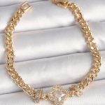 Pirinç Gold Renk Zirkon Taşlı Yonca Figür Zincir Model Kadın Bileklik - Vipsepet