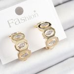 Pirinç Zirkon Taşlı Damla Figürlü Halka Model Gold Renk Kadın Küpe - Vipsepet