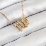 316L Çelik Zirkon Taşlı Sarmal Model Gold Renk Kadın Kolye - Vipsepet