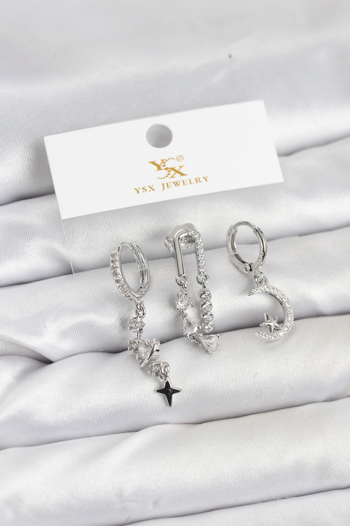 1766832376-bkp11569 Pirinç Gümüş Renk Zirkon Taşlı Uzay Model YSX Trio Küpe Seti - Vipsepet - Görsel 1