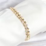 Pirinç Gold Renk VIP Seri Sarmal Damla Model Zirkon Taşlı Kadın Bileklik - Vipsepet