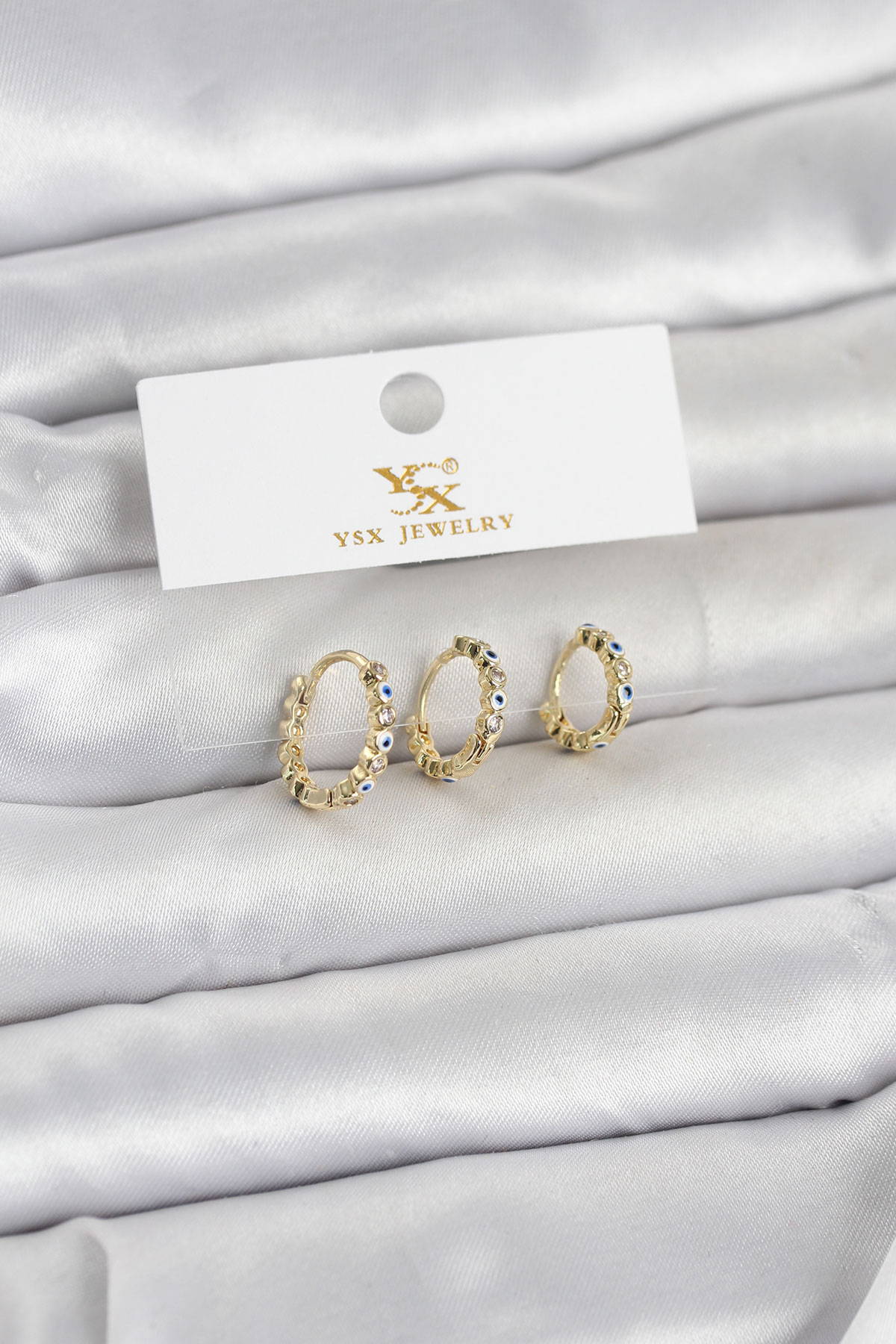 1775056369-bkp11711 Pirinç Gold Renk Nazarlı Model 3'lü Kadın Küpe - Vipsepet - Görsel 1