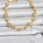 Pirinç Gold Renk Zirkon Taşlı Sıralı Yıldız Model Kadın Bileklik - Vipsepet