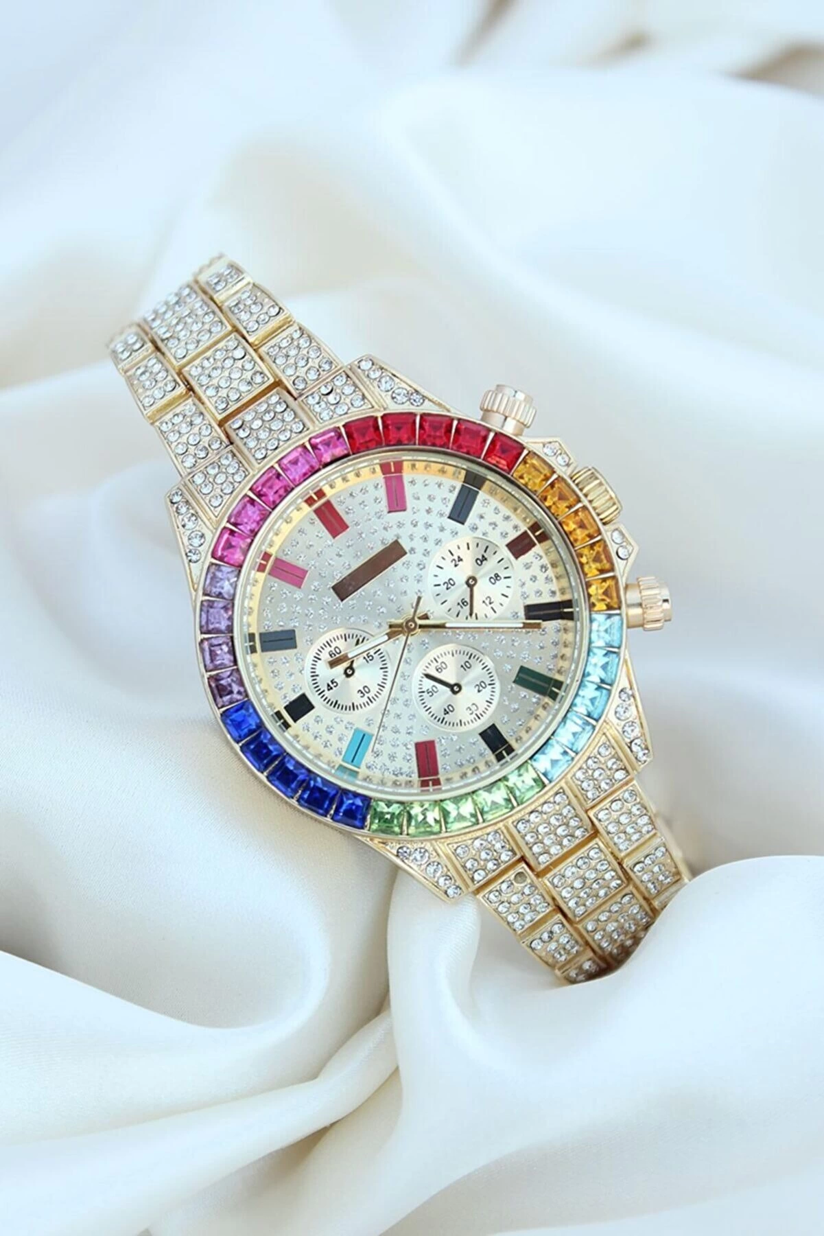 clariss-trend-gold-metal-kordonlu-zirkon-tas-kaplama-renkli-tasli-kasa-tasarimli-lux-62095446-sw1201sh1801 Clariss Trend Gold Metal Kordonlu Zirkon Taş Kaplama Renkli Taşlı Kasa Tasarımlı Lüx Kadın Kol Saati ( Lisinya ) - Görsel 1